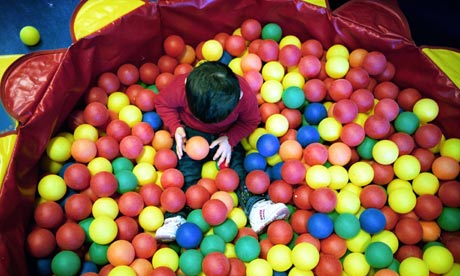 A-child-playing-in-a-ball-001.jpg